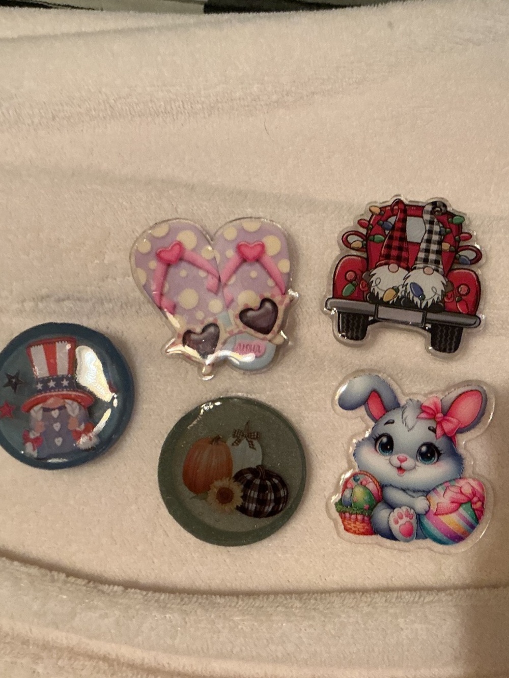 Interchangeable badge reel face plates